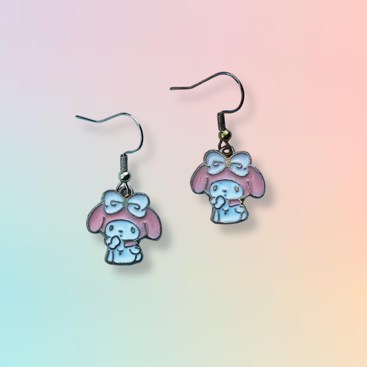 My Melody earrings on Daisy Chikk pastel earring card with purple and blue ombré background – handmade Sanrio-style kawaii jewellery