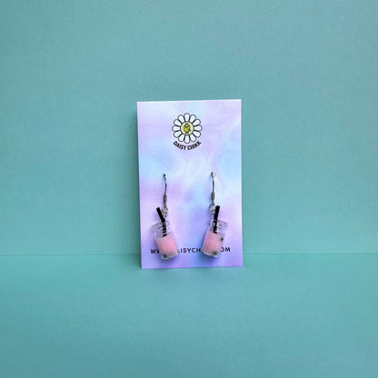 Pink boba tea earrings with silver hooks displayed on a pastel Daisy Chikk backing card – handmade kawaii bubble tea jewellery