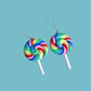 Rainbow swirl lollipop earrings with white sticks and silver hooks on a blue background – handmade kawaii dopamine-core jewellery